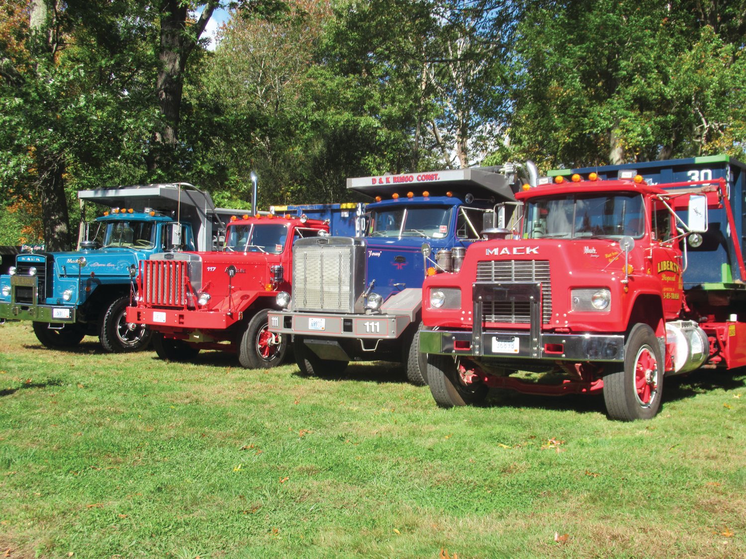 HEAVY HAULERS: The famous Mack trucks, which date back many moons and were used for big construction jobs, were huge hits for young old alike who took in Sunday’s Ocean State Vintage Haulers Fall Round-up.